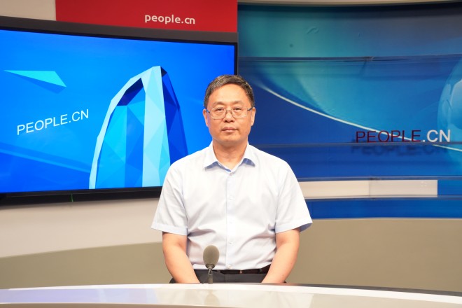 中國藝術研究院院長、黨委副書記周慶富做客人民網。張力洋攝